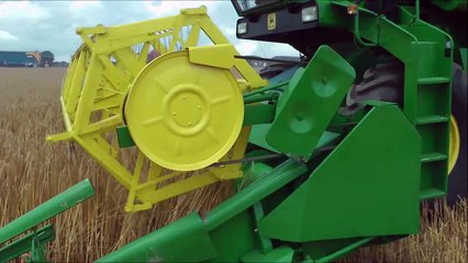 Vintage combine harvesters working