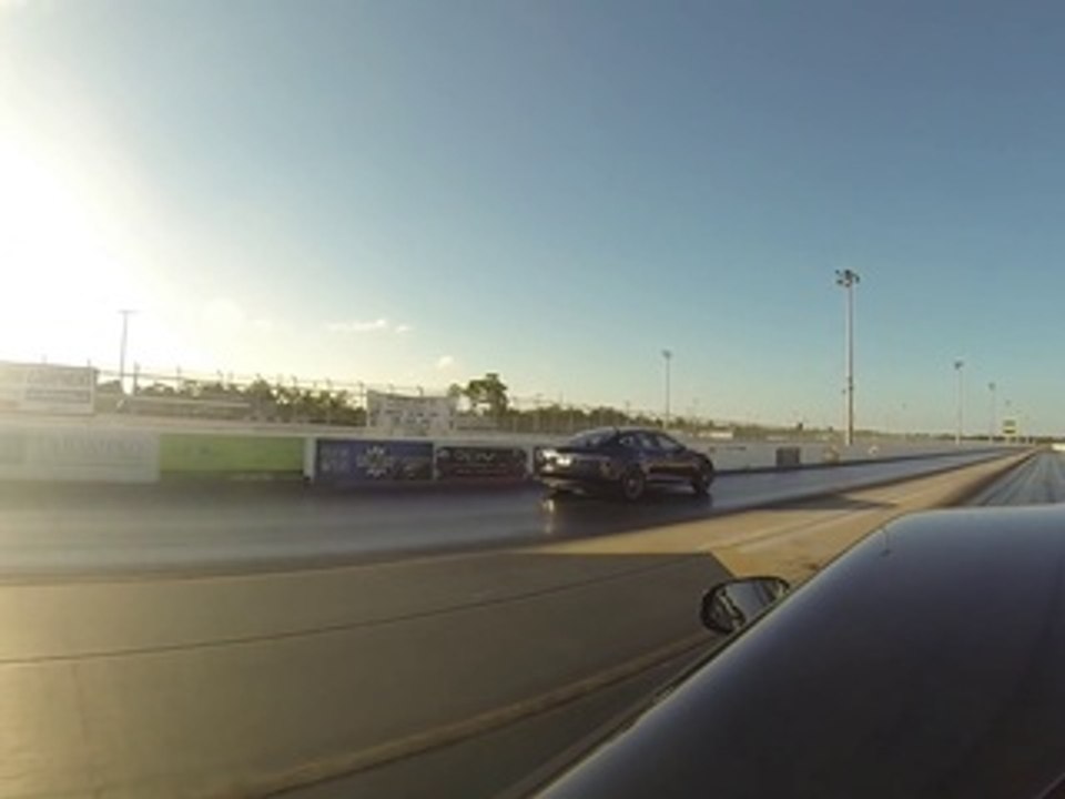 Tesla Model S P85D vs Ferrari F12 1_4 Mile Drag Racing