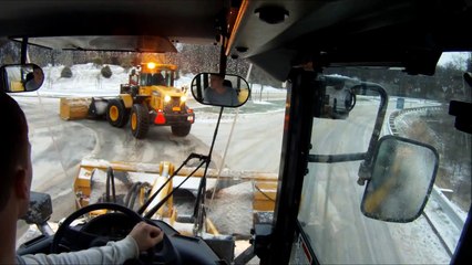Two Komatsu WA200 Loaders Plowing In Convoy