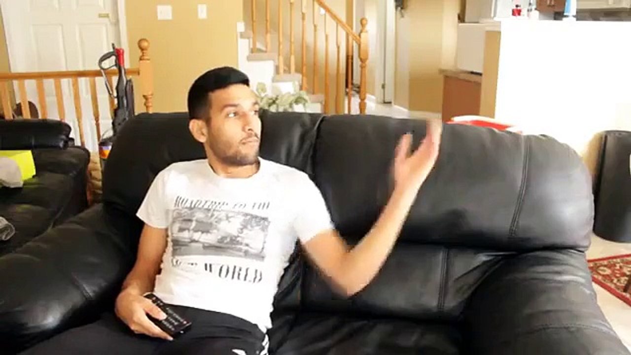 ZaidAliT-wathcing TV with mom