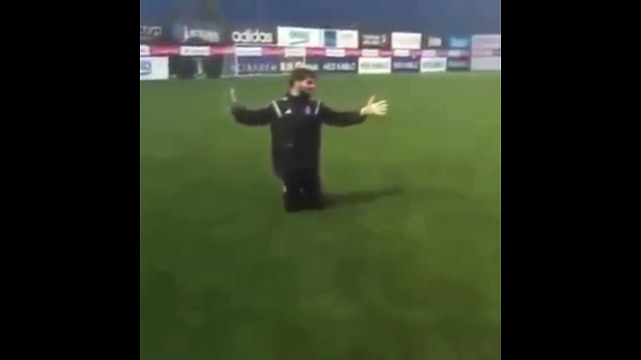 Besiktas goalkeeper Günay Güvenç scores from an impossible angle in training