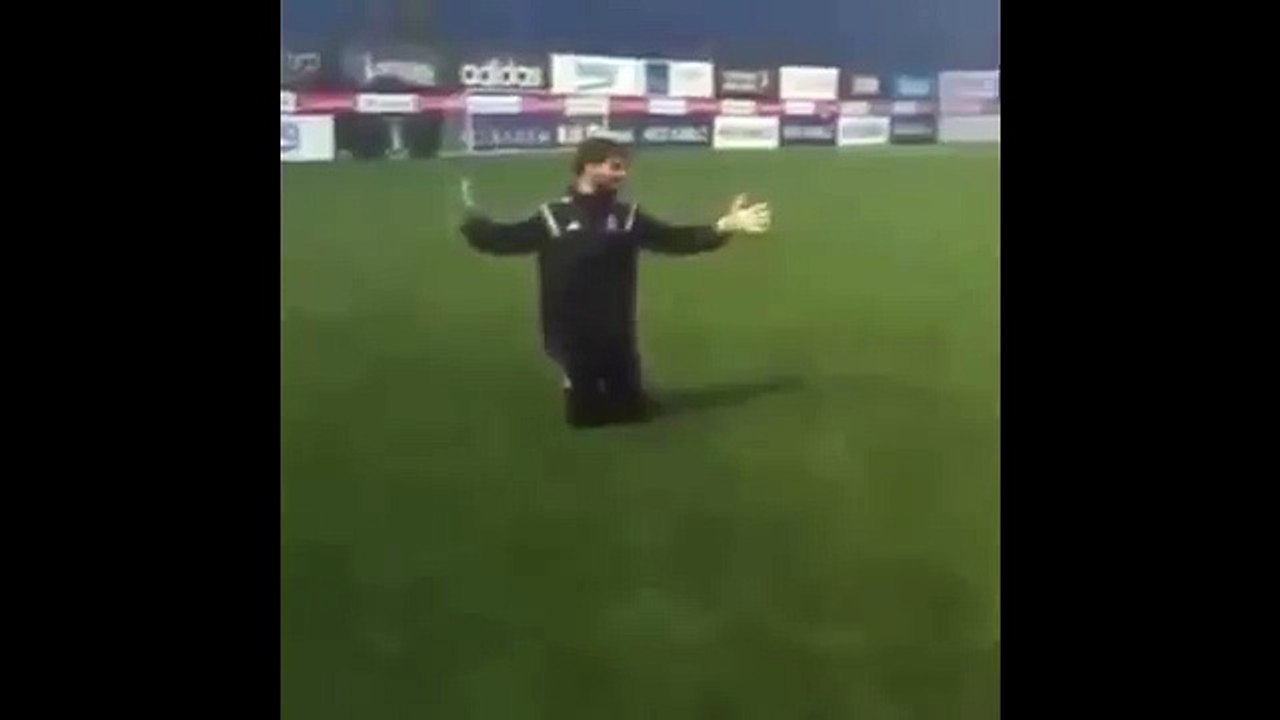 Besiktas goalkeeper Günay Güvenç scores from an impossible angle in training