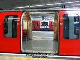 Central Line train doors open both sides.