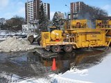 Snow Melter Clears Mountain of Snow