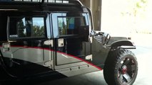 Awesome modified hummer at wheel pro company.MOV