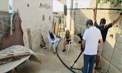 ابو بكر البغدادي مع احد الصحفيات الحسناوات