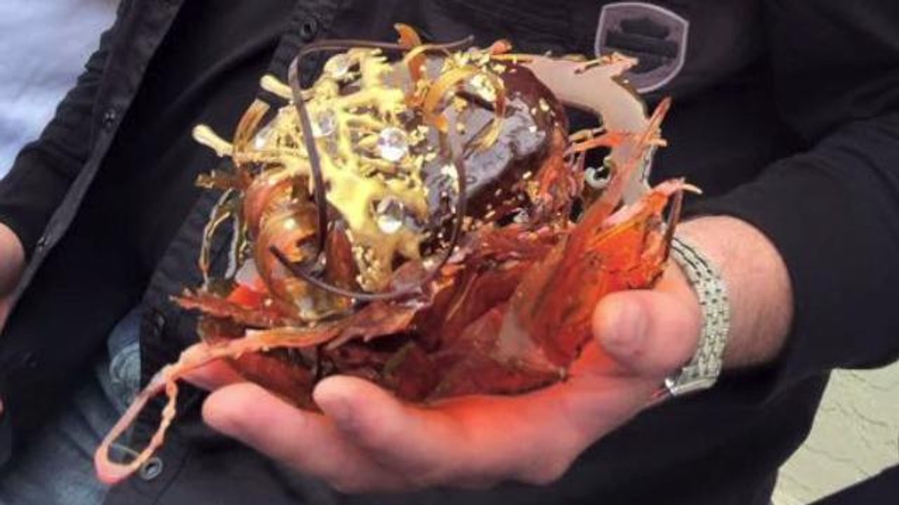 $100 Doughnut made with gold flakes and edible diamonds