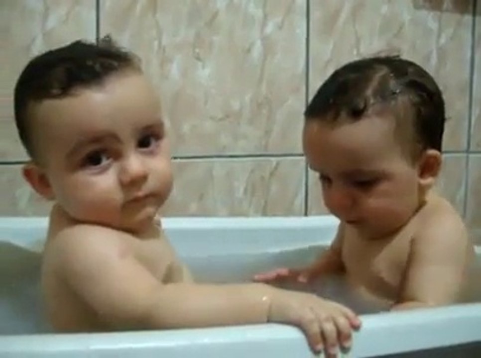 Twins Brothers Enjoying Bath Time
