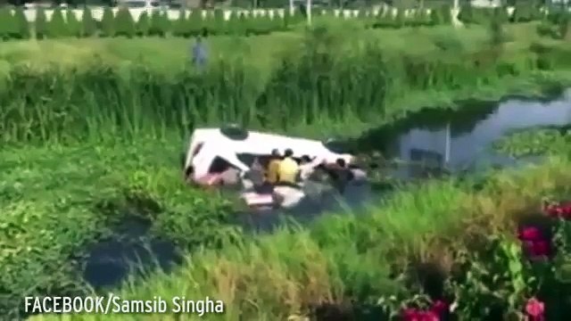 Watch dramatic moment seven men jump into river to save driver from drowning after car plunges