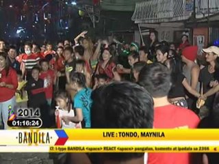 Tondo residents welcome 2014 in costumes
