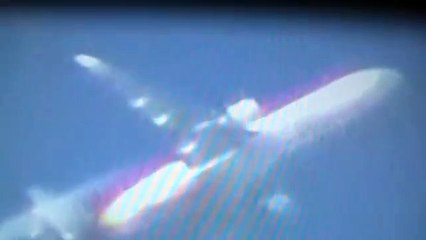 chem trail plane close up... with some thing on the rear!!!  must see......
