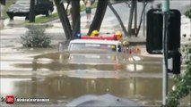 Fire truck drives through 11ft flood