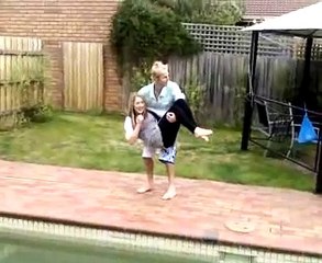 Lauren being thrown in the pool