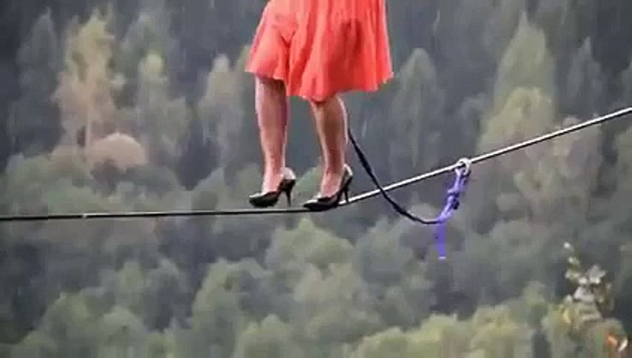 She Is Walking Over Rope With Heels