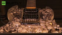 ▶ Germany- This $2 milllion gold-diamond guitar is the world's most expensive
