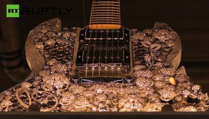 ▶ Germany- This $2 milllion gold-diamond guitar is the world's most expensive