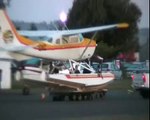 Float plane takes off from trailer.