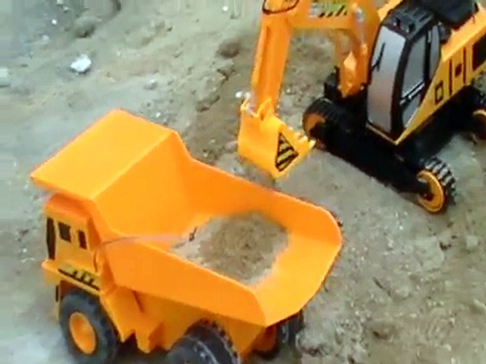Toy RC Dump Truck and Toy RC Shovel Arm Excavator in Action