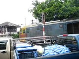 Thailand, Bangkok, the Royal train going through slums