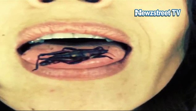 On Cam- Salma Hayek chews live insect