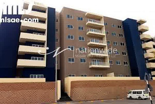 Spacious 1 Bedroom Apartment in Al Reef Downtown with Modern Open Kitchen with Dark Brown Cabinets Very Spacious .