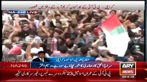 MQM workers surround PTI camp in Karimabad , PTI party flag torched