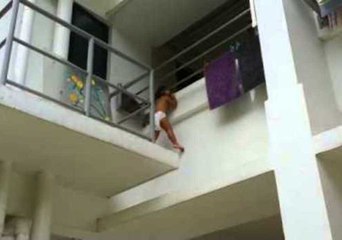Toddler Dangles From Second-Floor Railing
