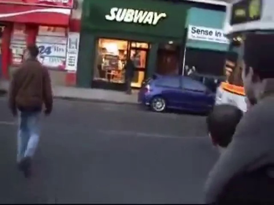 Drunk guy gets knocked down by a bus