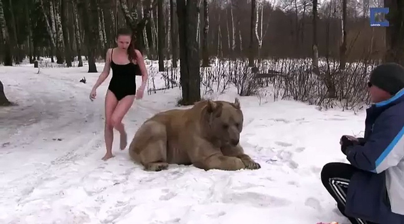 Russian Model Poses Next To Grizzly Bear