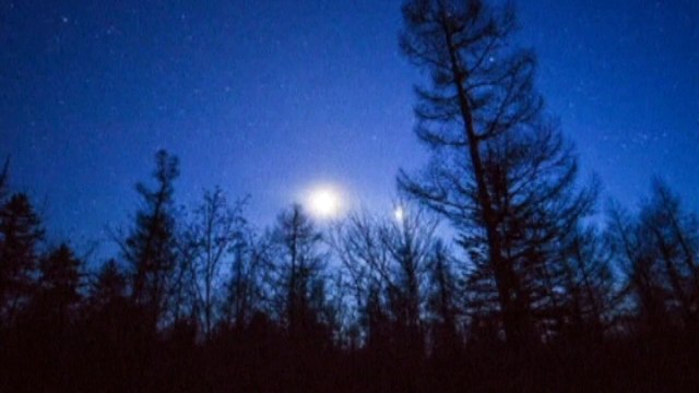 Spectacular meteor shower over mountains