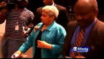 Mayor Shirley Franklin tries to avoid reporters questions