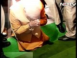 Narendra Modi bows down, touches the steps of Parliament