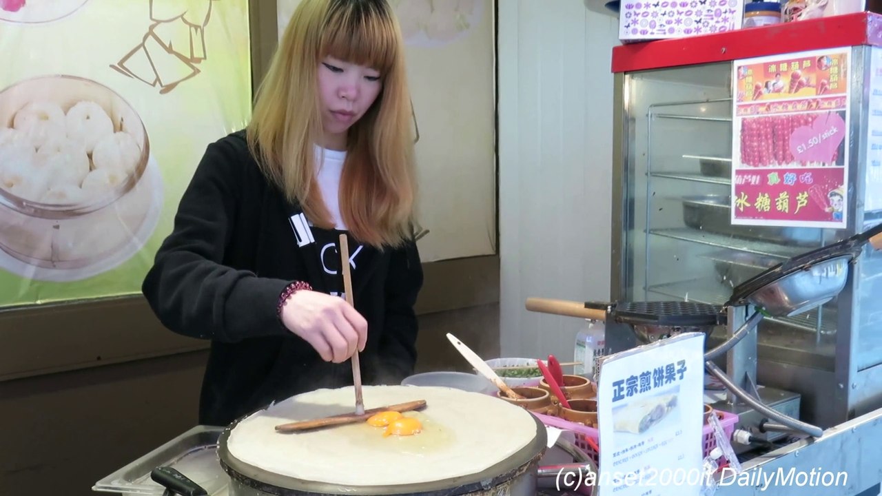 London Street Food. China Style Pancake with Eggs seen in Chinatown