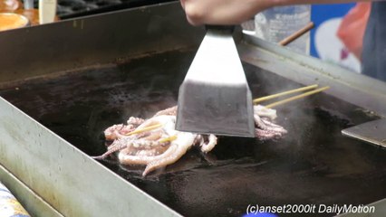 London Street Food. China Style Grilled Octopus seen in Chinatown