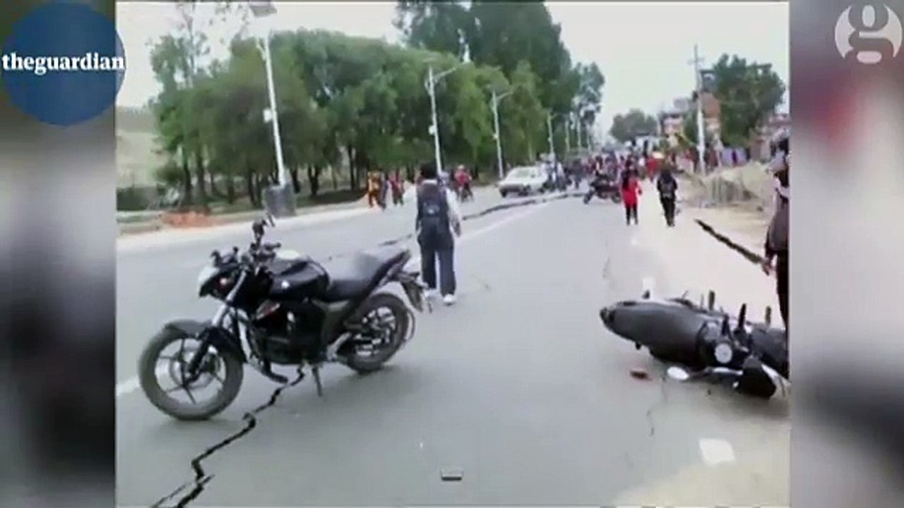 Large cracks in road after Nepal earthquake - video - World news - The Guardian