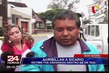 Acribillan a sicario dentro de un taxi en San Isidro