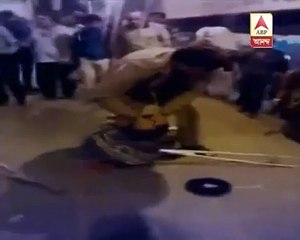 Cop thrashes disabled man in Howrah station !