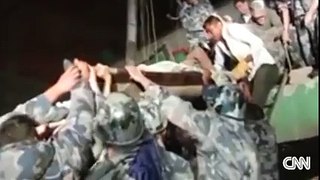 Video shows the moment rescuers pull survivors from Nepal earthquake rubble.