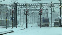 Arrivée d'un TER en Gare de Grenoble sous la neige