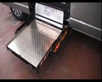 Underfloor wheelchair lifts for car campers bus. To lifts disabled person on vehicle