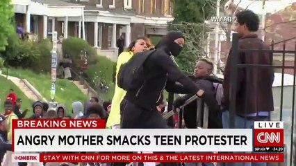Angry Mother Smacks Teen Protester