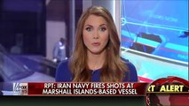 Iranian navy fires shots, boards cargo vessel