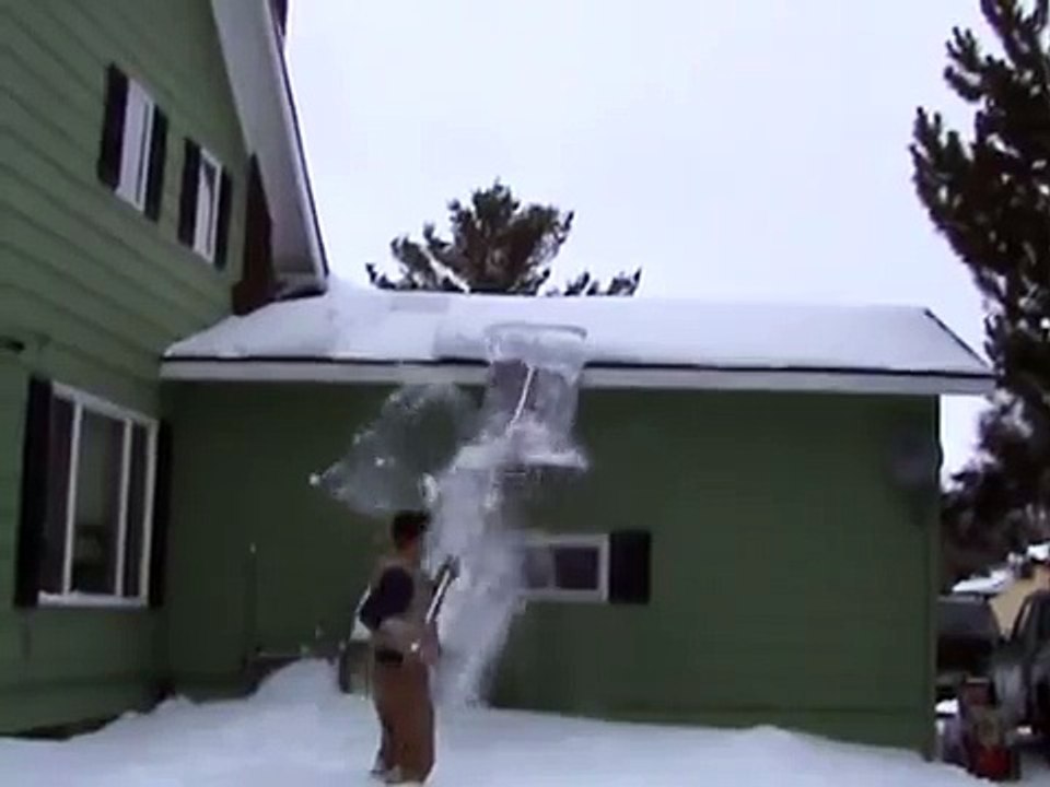 Removing Snow With The MinnSNOWta Roof Razor®