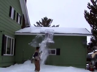 Removing Snow With The MinnSNOWta Roof Razor®