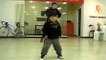 Young boy showing off his hip hop skills