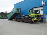 Hyvalift 40 Tons Hookloader on GINAF 10x4 lifting a heavy container