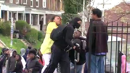 Angry mother beats son for participating in Baltimore riots