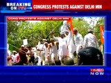Cong holds protest demanding Tomar's dismissal