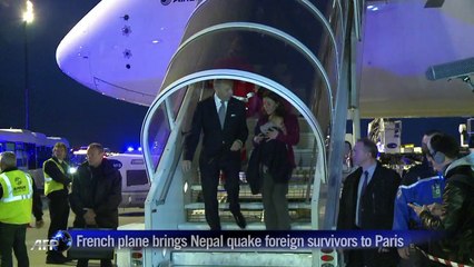 Foreign survivors of the Nepal earthquake arrive in Paris