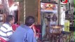 مواطنون يتابعون على تلفزيونات المقاهي حلف الرئيس الجديد لليمين